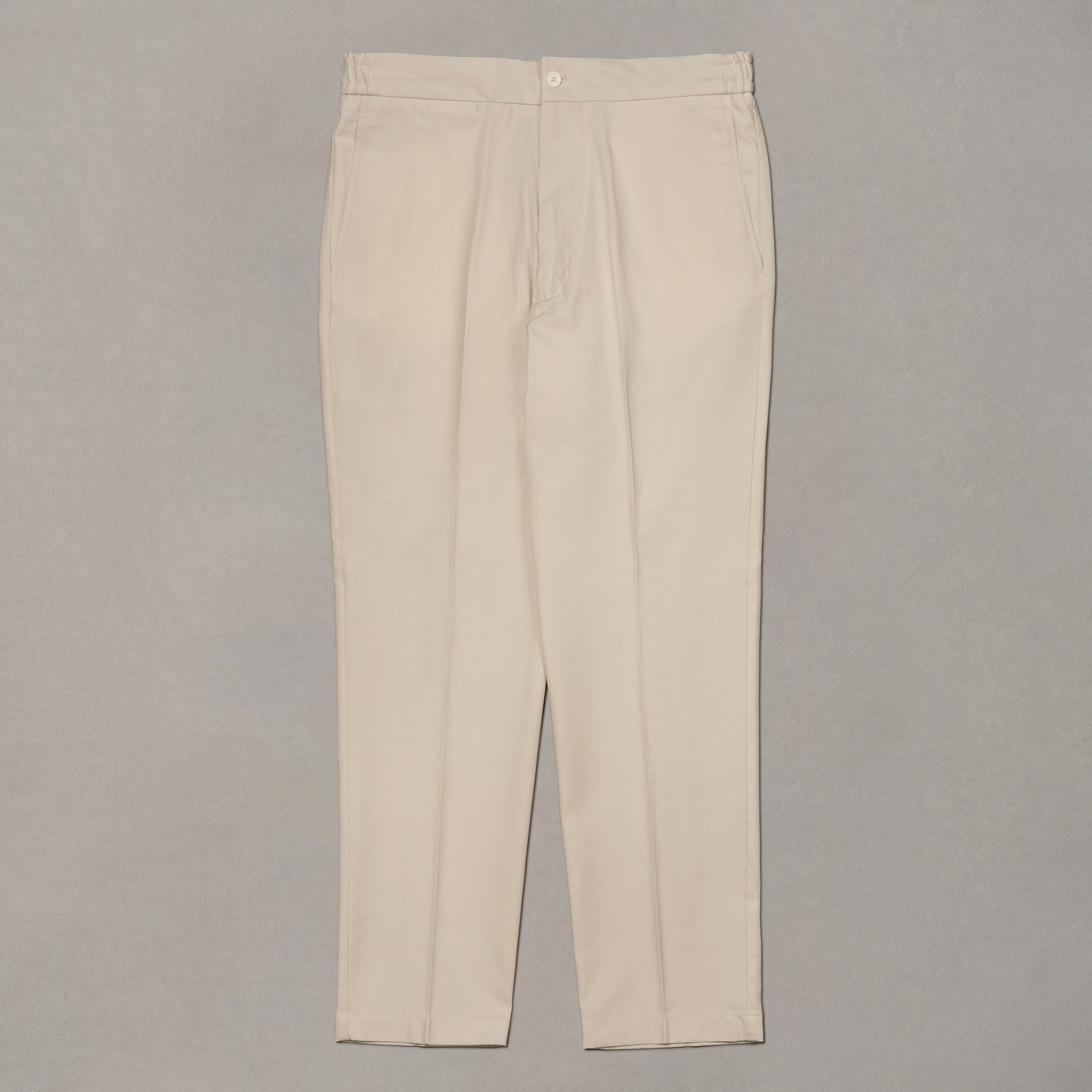 Ecrufarbene Bundfaltenhose