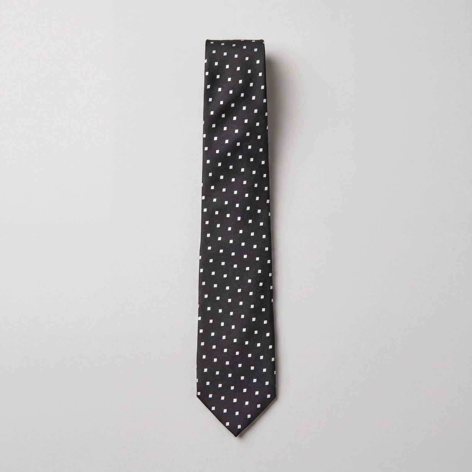 SMALL DOTS WITH A DARK SUIT